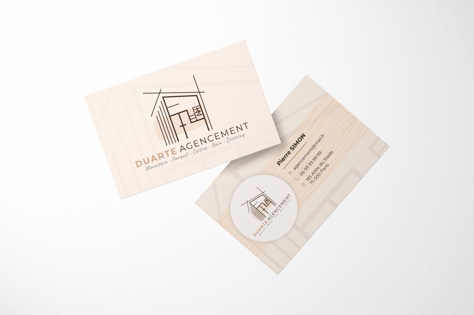 Cartes de visite Duarte Agencement : recto crème au logo, verso façon bois clair avec les coordonnées et le logo dans un rond