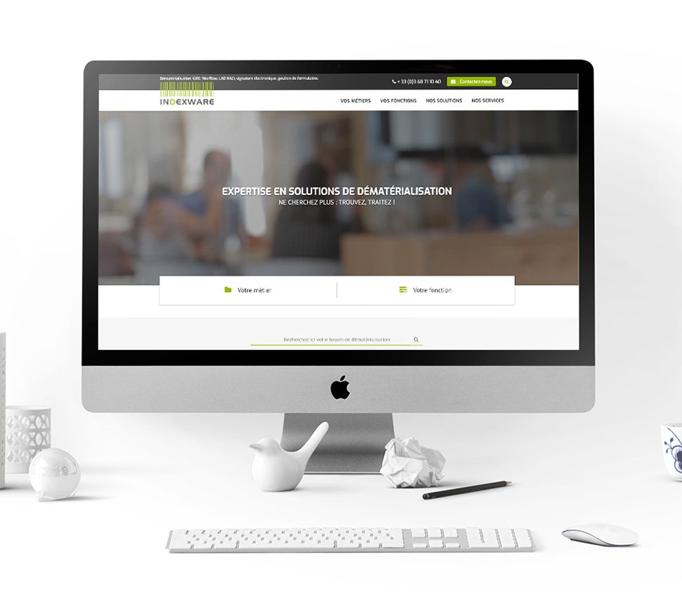 Page d’accueil du site Indexware, « Expertise en solutions de dématérialisation », sur un écran d’ordinateur
